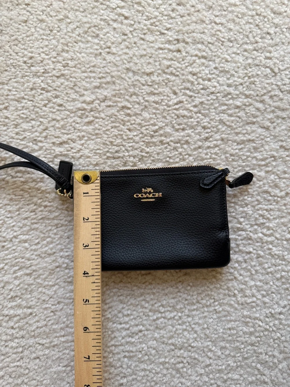 Coach Black Pebbled Leather Pouch with Gold Emblem